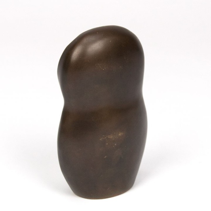 Abstractly designed vintage sculpture of an owl