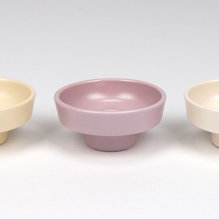 Set van 4 pastelkleurige vintage eierdopjes