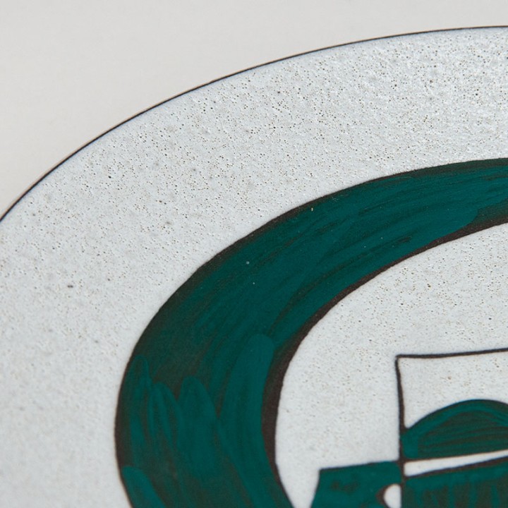 Ceramic vintage plate with abstract image