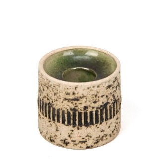 Small earthenware vintage candlestick