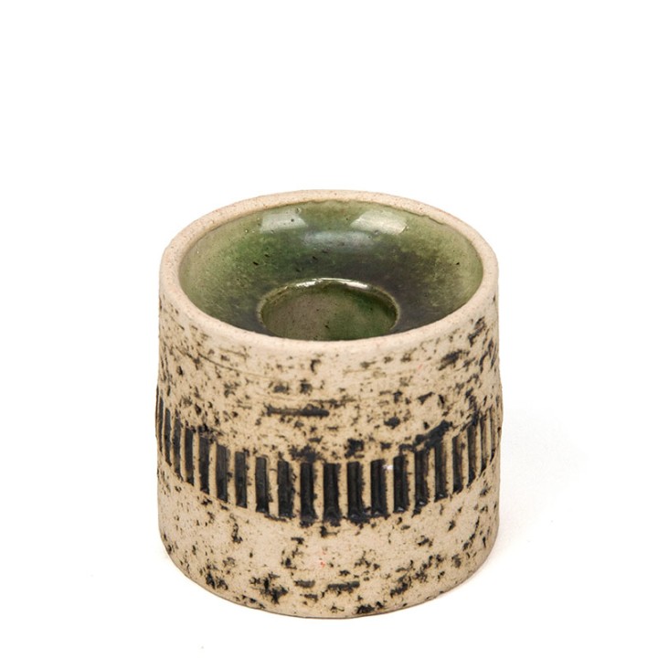 Small earthenware vintage candlestick