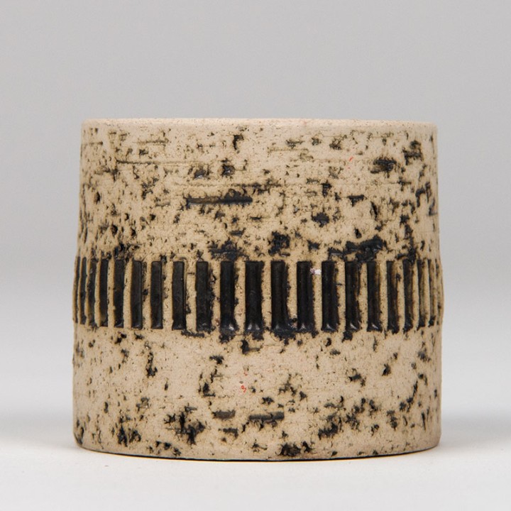 Small earthenware vintage candlestick