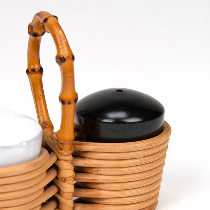 Vintage salt and pepper set in bamboo holder
