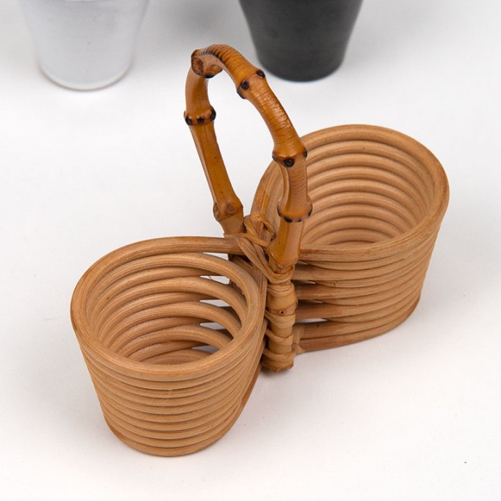 Vintage salt and pepper set in bamboo holder