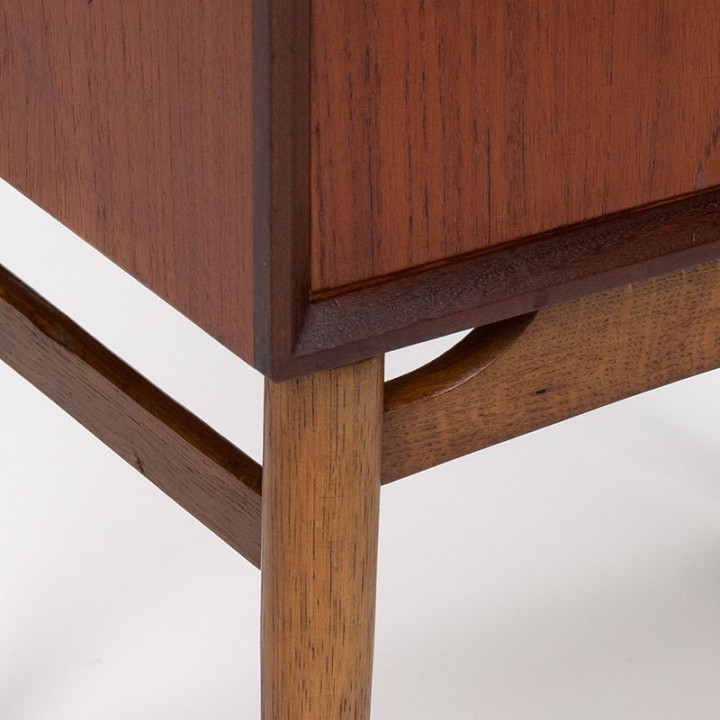 Small Mid-Century Danish cabinet in teak on an oak base